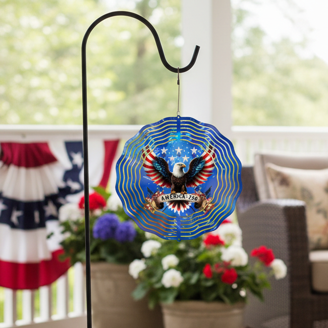 America 250 Eagle Wind Spinner hanging on shepherd's hook on upscale patriotic patio